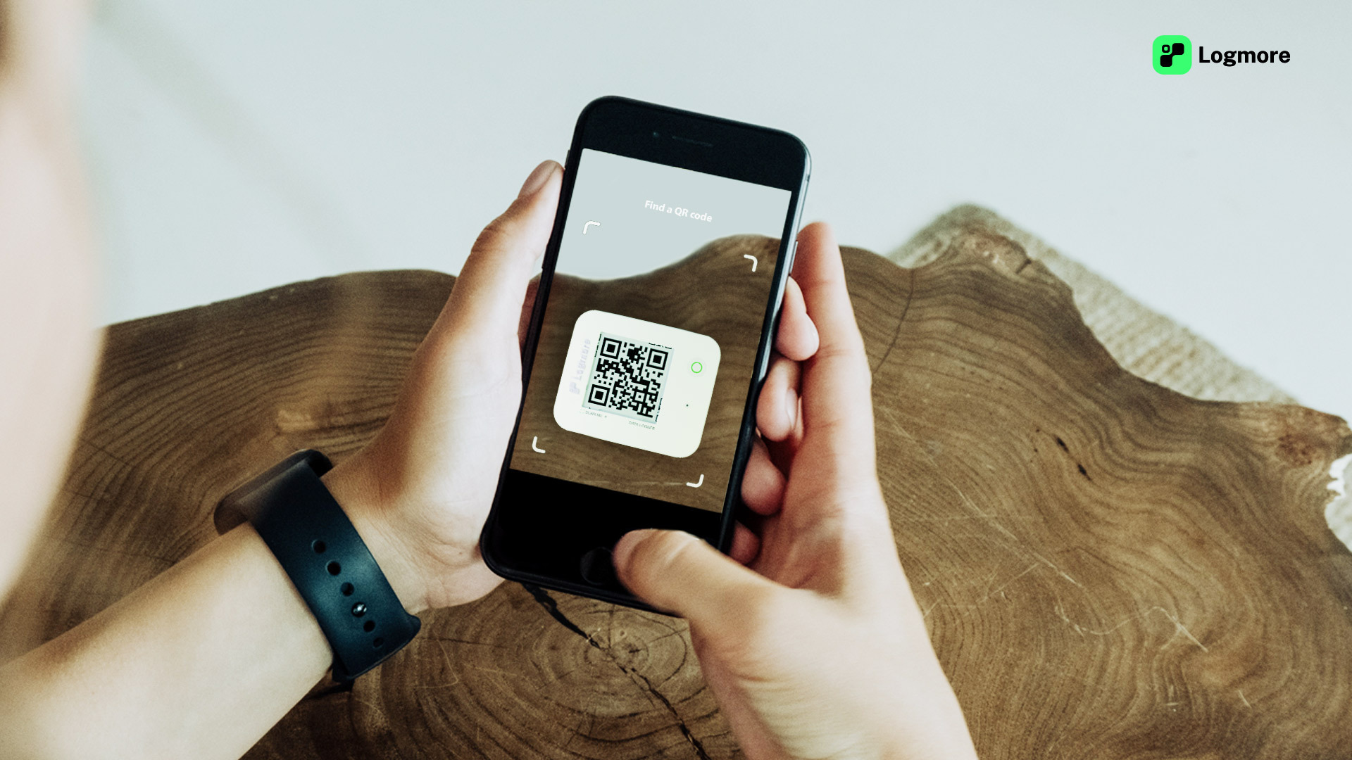A Logmore QR data logger being scanned with a phone